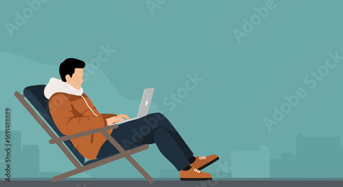 Young man relaxed, working remotely on his laptop from a comfortable deck chair with an urban backdrop, symbolizing modern flexible work-life.