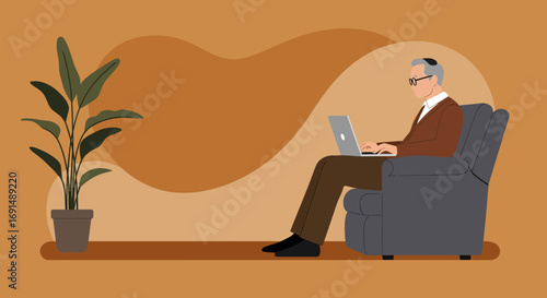 Elderly man wearing a yarmulke comfortably uses a laptop in an armchair next to a houseplant. Depicts senior digital engagement, remote connectivity, and modern lifestyle.