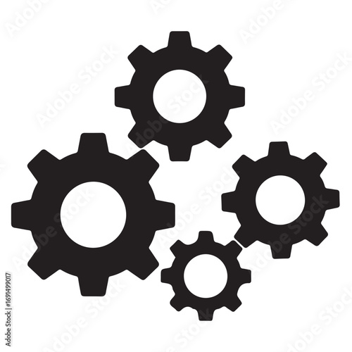 Four black interlocking gears mechanism cogwheels industry