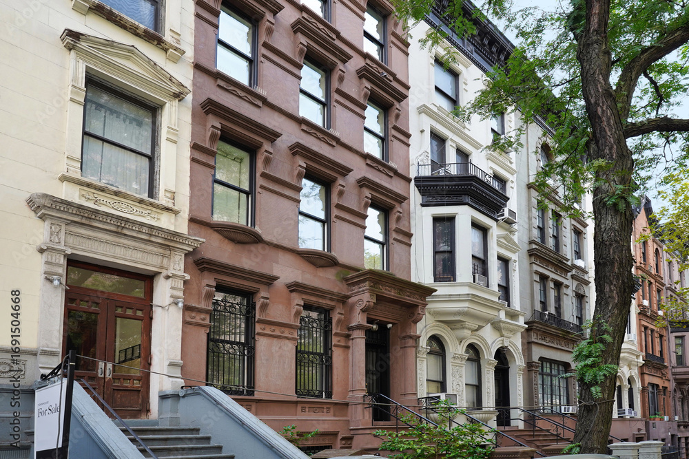 Naklejka premium Old 19th century brownstone type townhouses in Upper West Side of Manhattan
