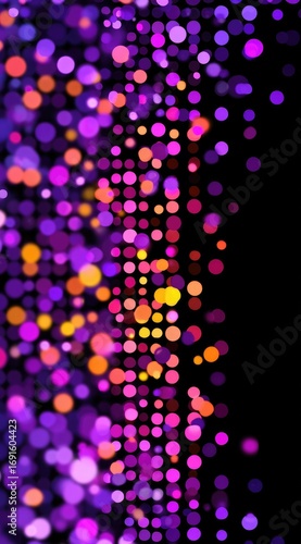 A vibrant vertical cascade of blurry, colorful dots in hues of purple, pink, and orange descends onto a stark black background