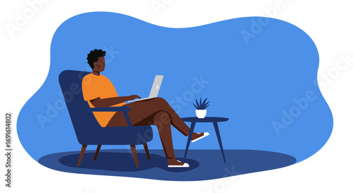 Young man working remotely on a laptop from the comfort of his home armchair. Illustrates modern work-life balance, online education, or freelance productivity.