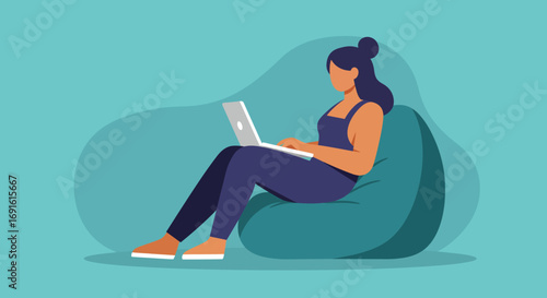 Woman working remotely on a laptop, comfortably seated on a bean bag. Ideal for concepts of flexible work, freelance, and online learning.
