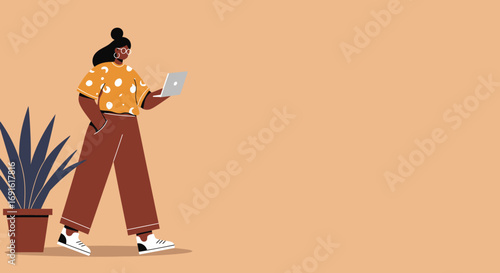 Stylish woman focused on her laptop, working remotely or studying online. Modern freelance lifestyle and digital productivity concept.