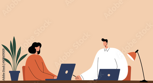 Colleagues collaborating on laptops in a modern office environment, symbolizing teamwork, remote work, and professional productivity.