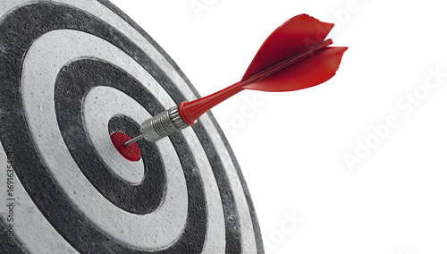 A close-up image of a dart hitting the bullseye, symbolizing achievement and success in business goals and strategies.