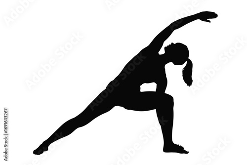 Athletic woman performing yoga side angle pose fitness exercise