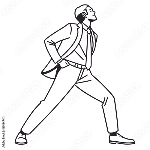 Man in suit with hands on hips, looking up confidently