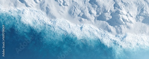 Aerial view of icy mountains and water