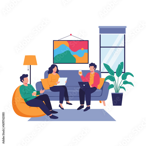 Young professionals collaborating and working together on laptops in a modern shared office space enjoying a casual meeting