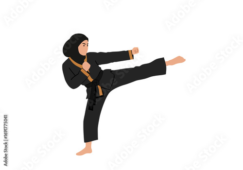 Young Woman in Hijab Executes a Powerful Martial Arts Kick.
