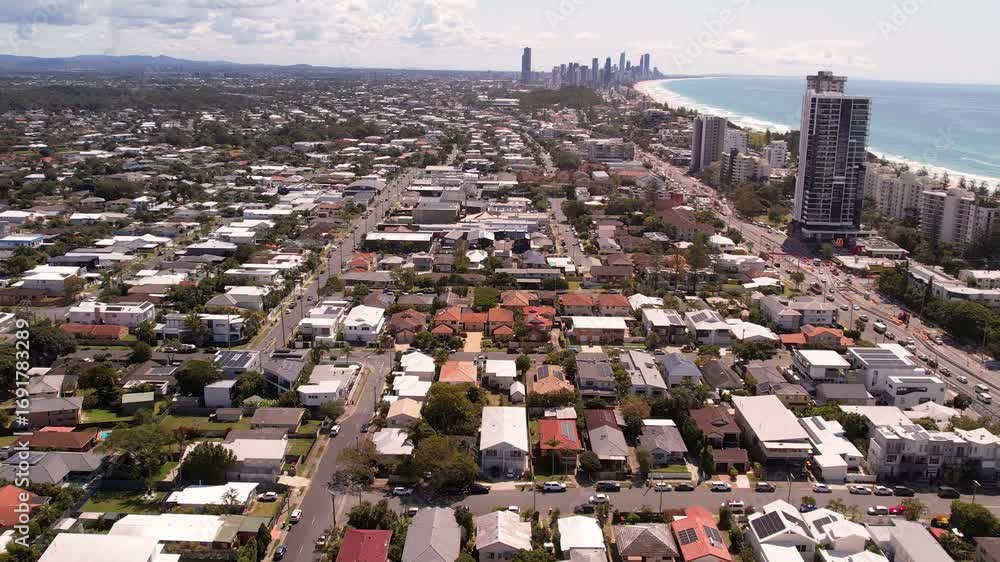 Aerial views of Burleigh Heads urban beach front skyline along the Gold Coast region of Queensland, Australia