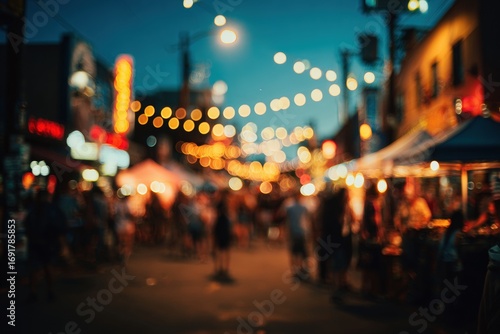 Blurred city street fair at night
