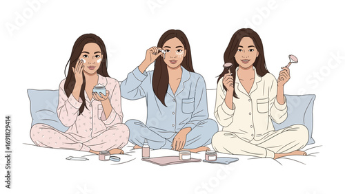 Three young women in pajamas applying skincare products and makeup while sitting on a bed enjoying a beauty routine together