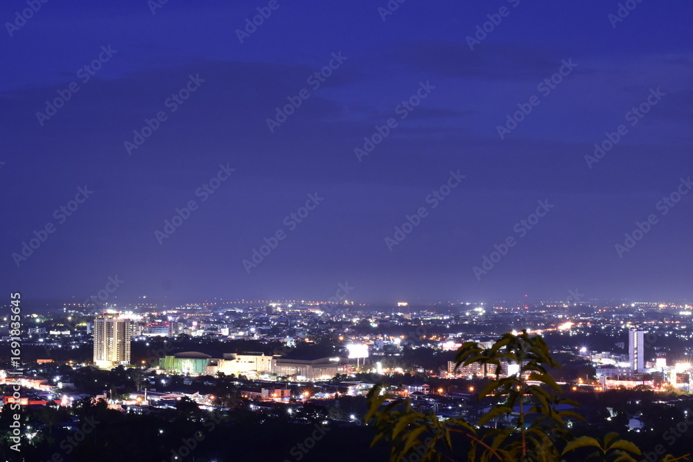Fototapeta premium abstract night light of cityscape bokeh, Night view lantern light, Hanging lantern at sunset over city 