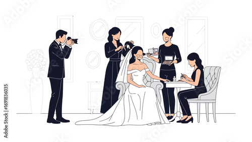 Professional wedding photographer capturing a beautiful bride in her gown with assistants preparing her for the special day indoors
