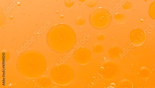 Abstract pattern of translucent orange bubbles