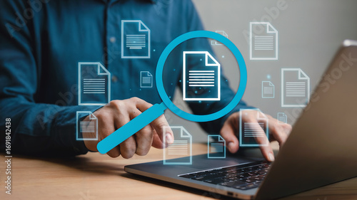 Folder Hierarchy Structure and Document Management System (DMS) – Businessman Using Laptop Computer to Save, Organize, and Classify Digital Files