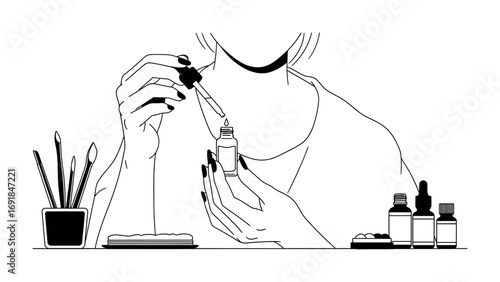 Close up of a person s hands holding a dropper bottle with liquid applying skincare serum for beauty and self care routine
