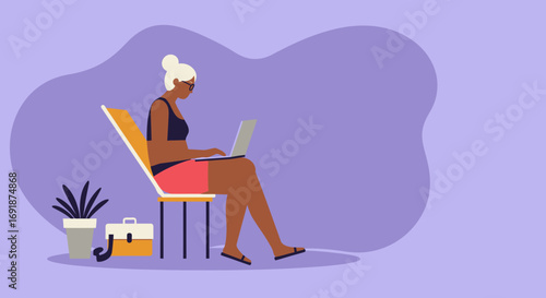 Mature woman working remotely on laptop from home, enjoying a flexible and comfortable work-life balance. Ideal for concepts of productivity, freelance, and modern lifestyle.