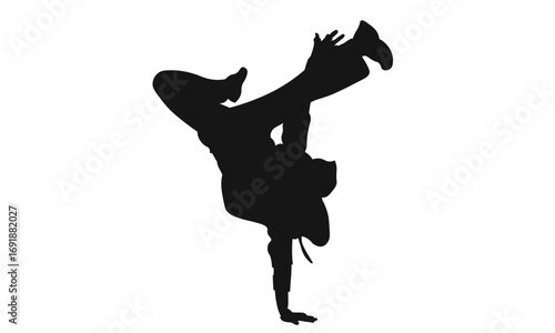 Silhouette of a breakdancer performing a freeze, showcasing dynamic movement and athleticism on a white background.