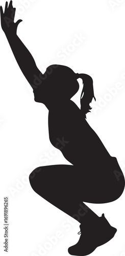 Silhouette of a woman performing a fitness exercise in a dynamic pose