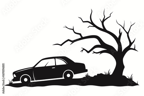 Silhouette of a car on the road next to a tree