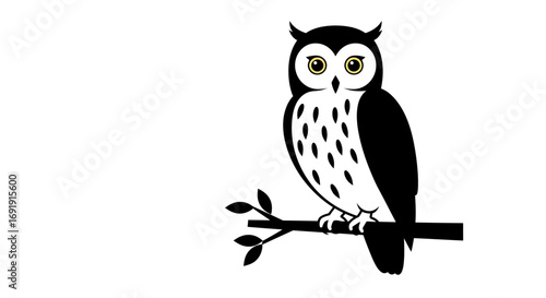 An owl with yellow eyes and black spots perches on a branch