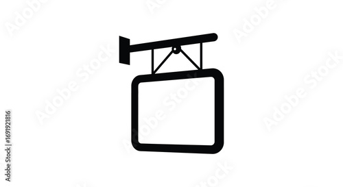 a hanging signboard attached to wall by metal brackets