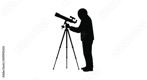 a person observing through a telescope at night