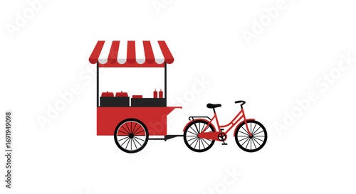 a red food cart with striped awning parked beside bicycle