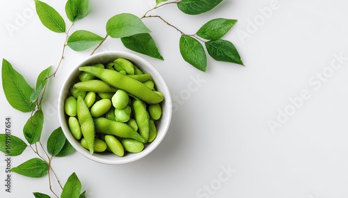 Wallpaper Mural Fresh edamame in a white bowl, surrounded by leaves Torontodigital.ca