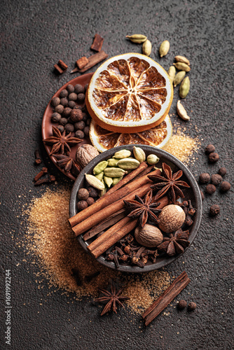 Fototapeta Naklejka Na Ścianę i Meble -  Christmas spices close up. Seasonal winter spices for mulled wine.