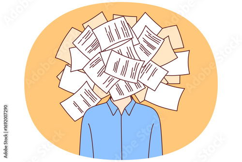 Man suffering from bureaucracy and overabundance of paperwork stands with bunch of documents instead of face. Problem of paperwork clogging brain of businessman who needs to digitalize work process