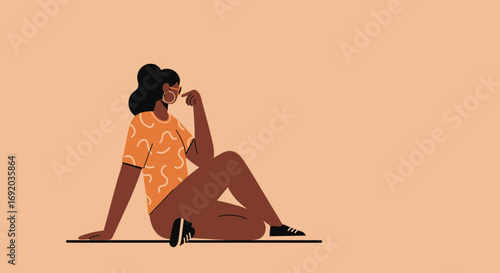 Modern Black woman relaxing casually, thoughtfully enjoying leisure time in a minimalist home setting. Ideal for lifestyle, wellness, or personal reflection concepts.