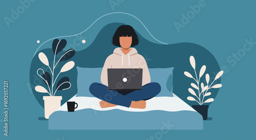 Young woman comfortably working remotely from her bed with a laptop. Illustrates freelance, telecommuting, and flexible modern lifestyle.