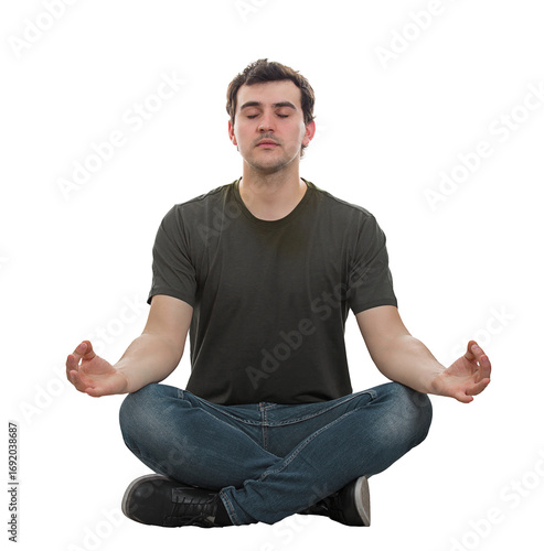 Calm young man sitting on the floor with eyes closed and crossed legs and raising hands showing zen gesture like practicing yoga. Relaxed guy meditate in lotus pose isolated on transparent background