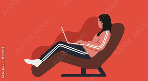 Woman comfortably uses a laptop while reclining in a chair, ideal for concepts of remote work, online education, or relaxed home productivity and digital lifestyle.