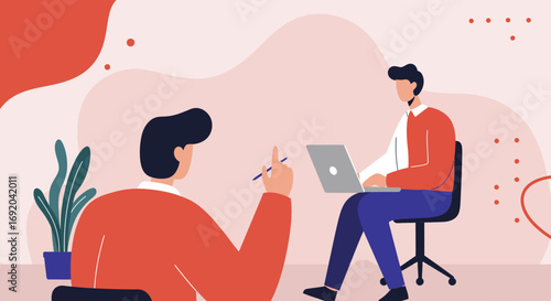 Two men in a modern office collaborate: one presents an idea, the other works on a laptop. Captures teamwork, business discussions, and productivity.