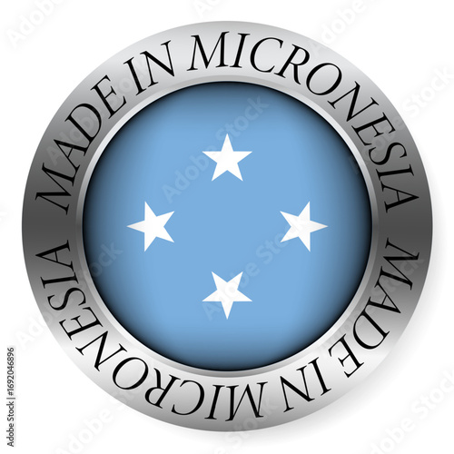 Made in Micronesia button icon. Circular emblem with metallic border, glossy central flag, and bilingual label indicating product origin and international manufacturing identity.