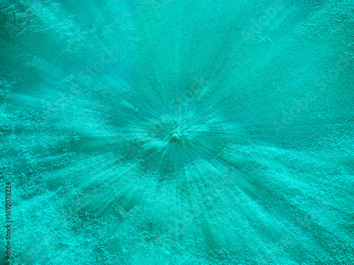Abstract image in aqua color of sand at the bottom of the sea.