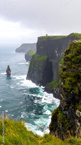 Rugged cliffs meet stormy sea