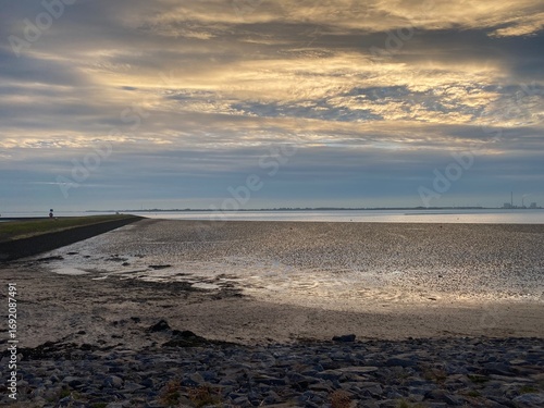 Obraz na plátne sunset on the beach at the wadden sea during ebb