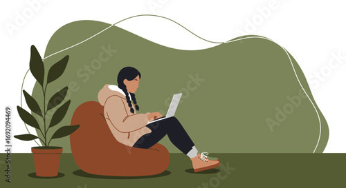 Young woman with braids comfortably works on her laptop from a beanbag chair at home. Ideal for remote work, online learning, or modern lifestyle concepts.