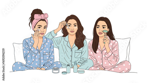 Three young women in pajamas applying skincare products and face masks during a relaxing nighttime beauty routine at home