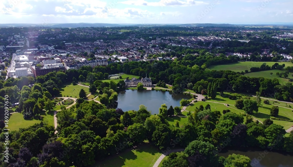 Fototapeta premium High-angle view of a city park with a lake