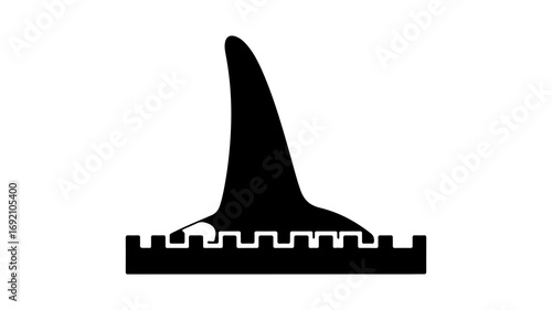 Shark fin above textured surface with transparent background