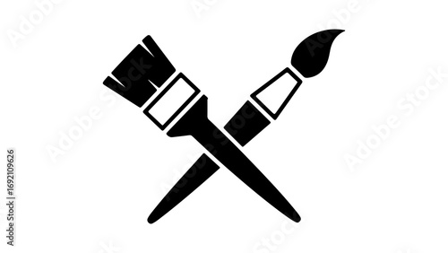 Two crossed paint brushes with transparent background