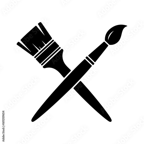 Two crossed paintbrushes with transparent background