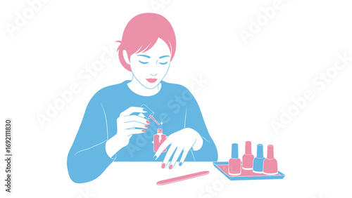 Young woman with short pink hair applying red nail polish to her fingernails while sitting at a table with polish bottles